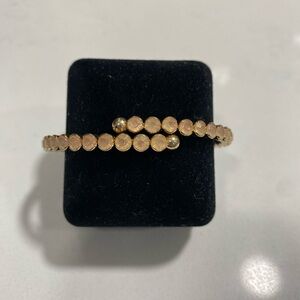 Elegant Wrap Bracelet with Pale Pink Stones Encased in Gold-tone Metal